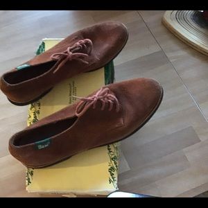 Rust flat suede lace shoes that’s slightly warn